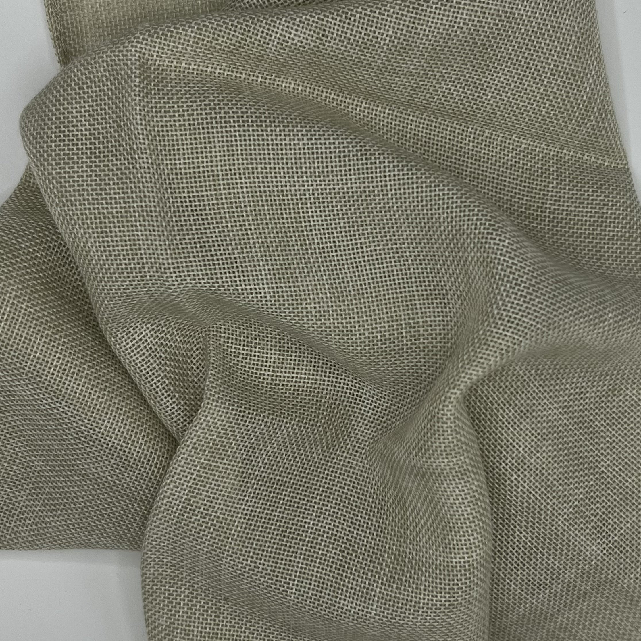 Champaign beige colored fabric with large wavy folds