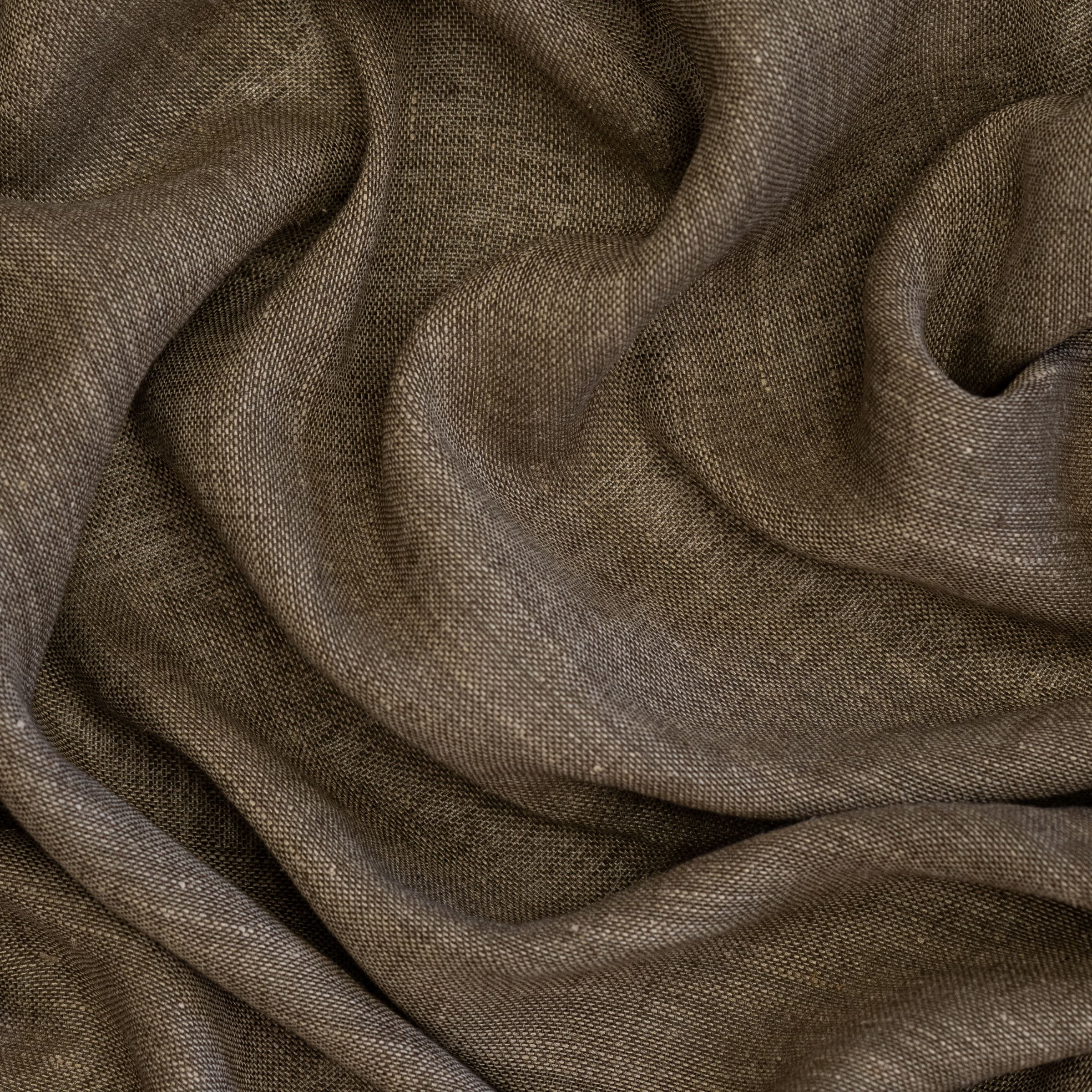 Brown/gray textured fabric with large folds