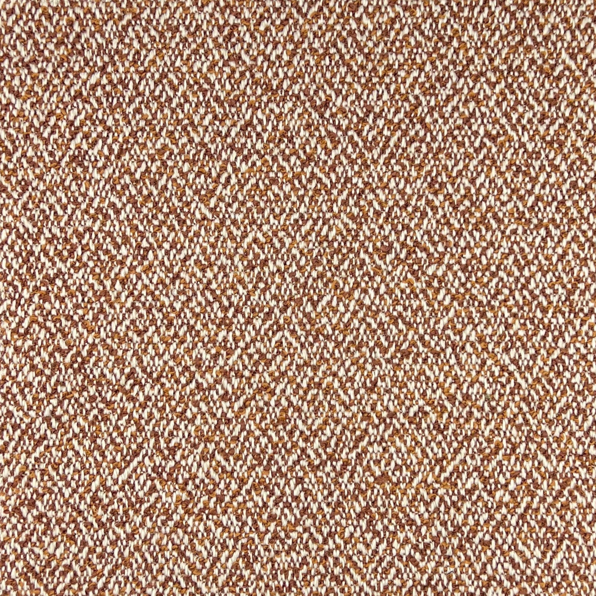 Mia is an upholstery fabric with a mottled texture with three interplaying fibers of orange, brown and white fibers, creating visual depth. 