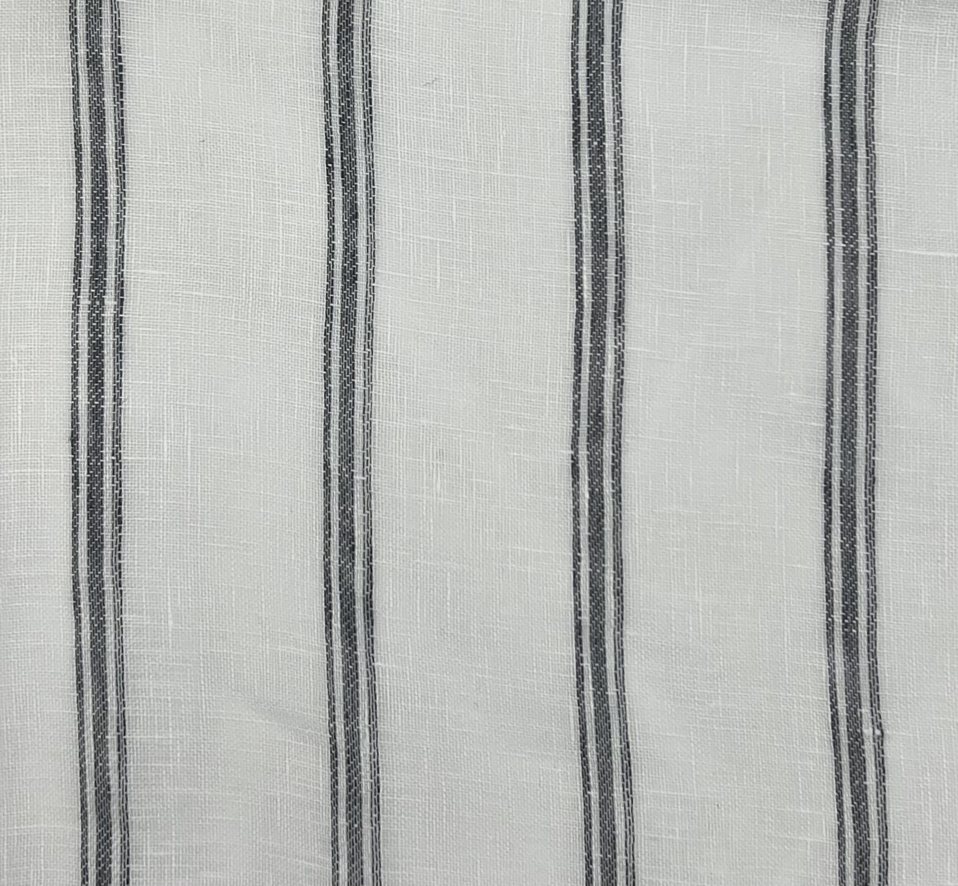 Mykonos fabric is an off-white linen fabric, with a thin charcoal gray colored stripe.