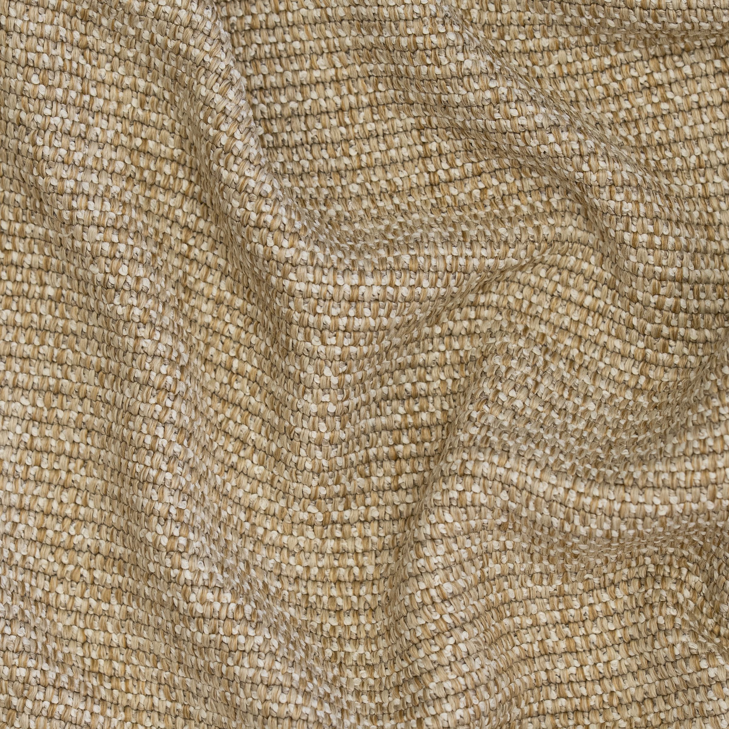 Close-up of a beige textured fabric with large crinkles 