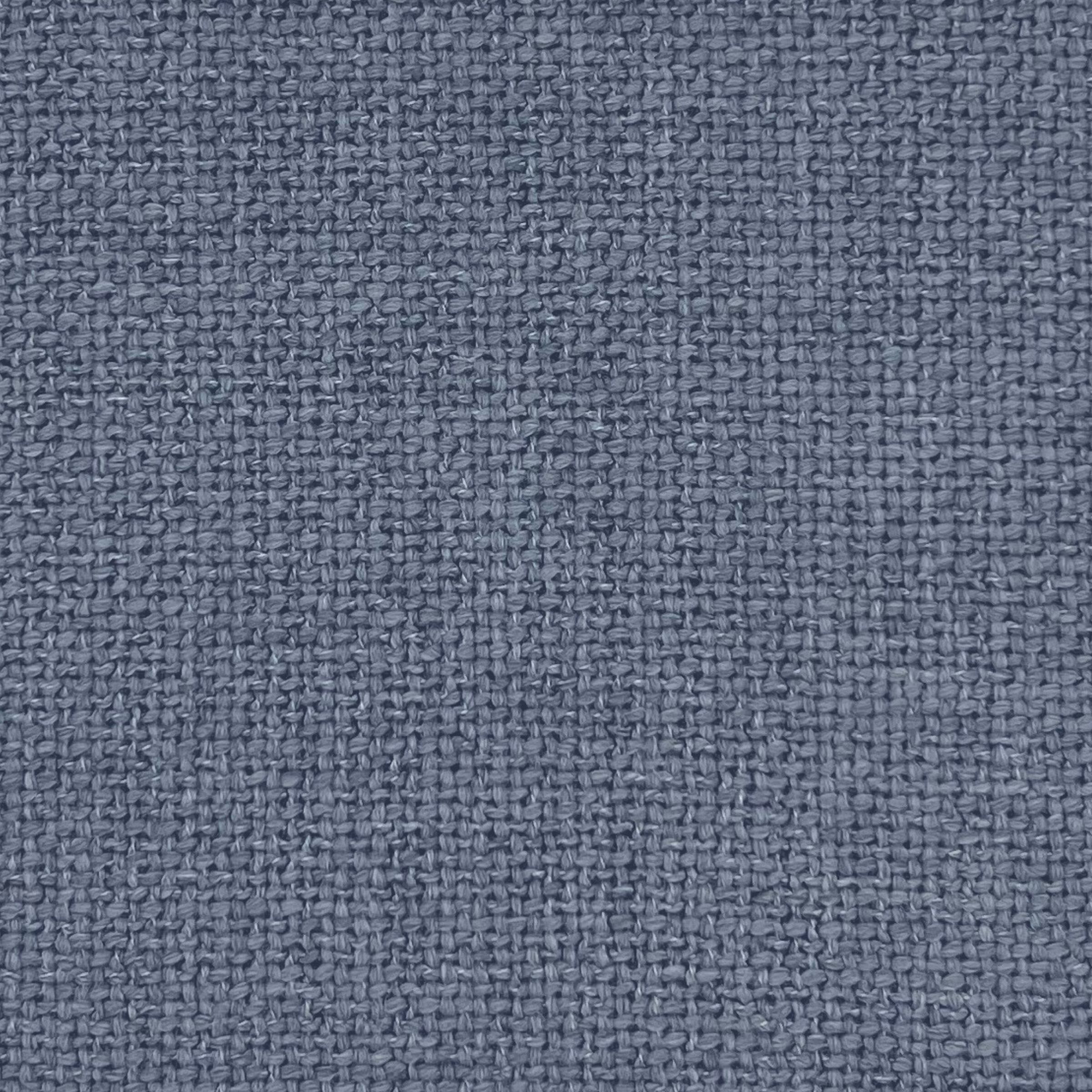 Smoke upholstery fabric, showcasing its subtle texture and blend of blue and gray fibers, creating a durable and versatile surface for furniture.