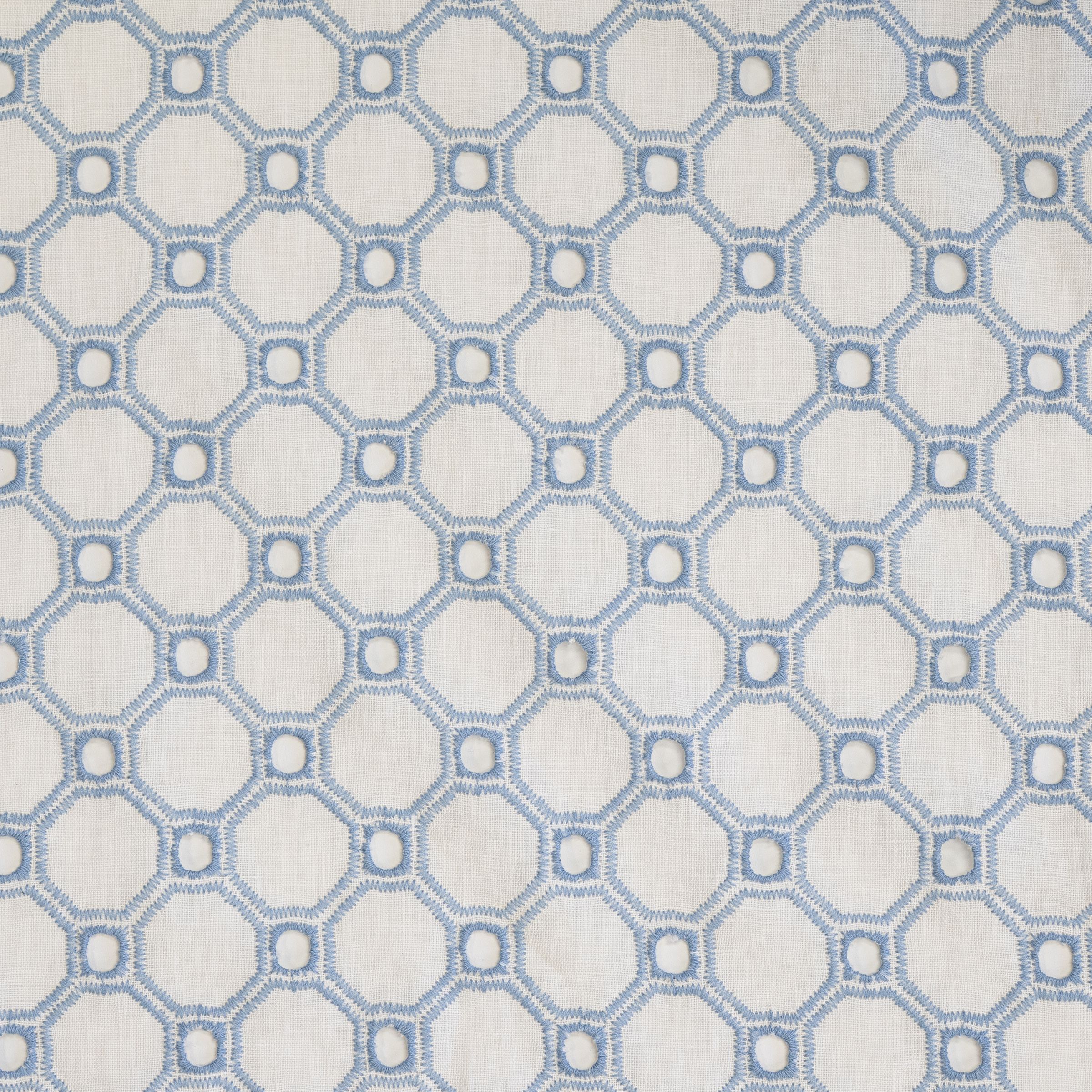Hexagonal blue pattern fabric swatch on a white background