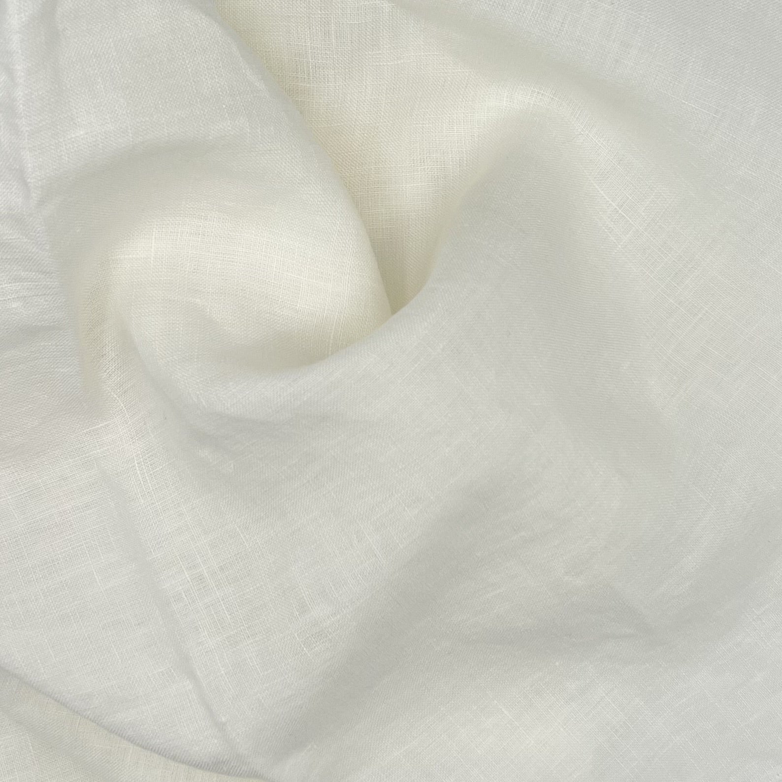 Snow fabric in a clean, bright white tone with a soft texture, adorned with a swirl fold