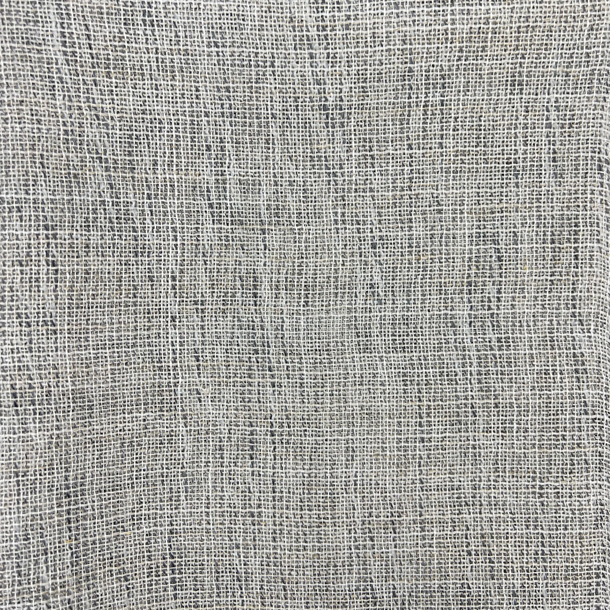 Dark gray fabric with subtle light and dark variations in the fibers, creating a textured appearance