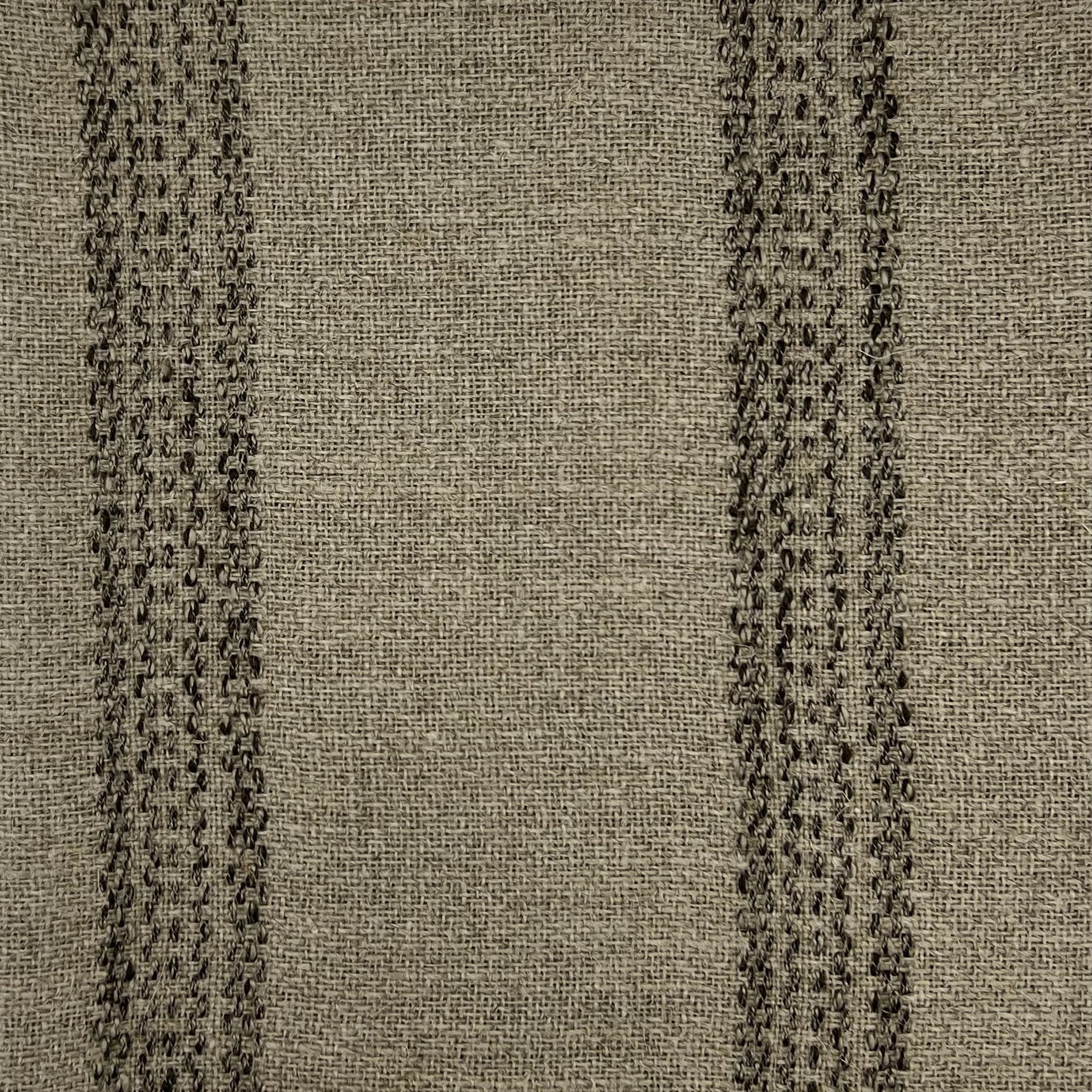 Beige fabric with a relatively loose weave and distinct, thick vertical stripes of a dark brown.