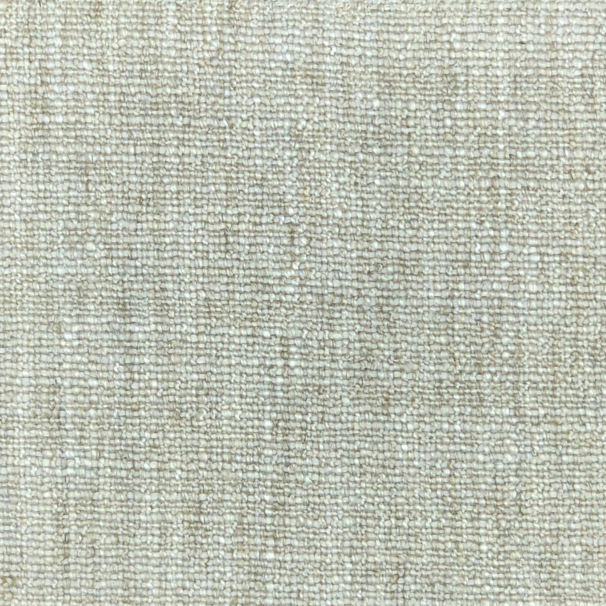 Close-up of off-white upholstery fabric showing a tight, consistent plain weave pattern with subtle color variations