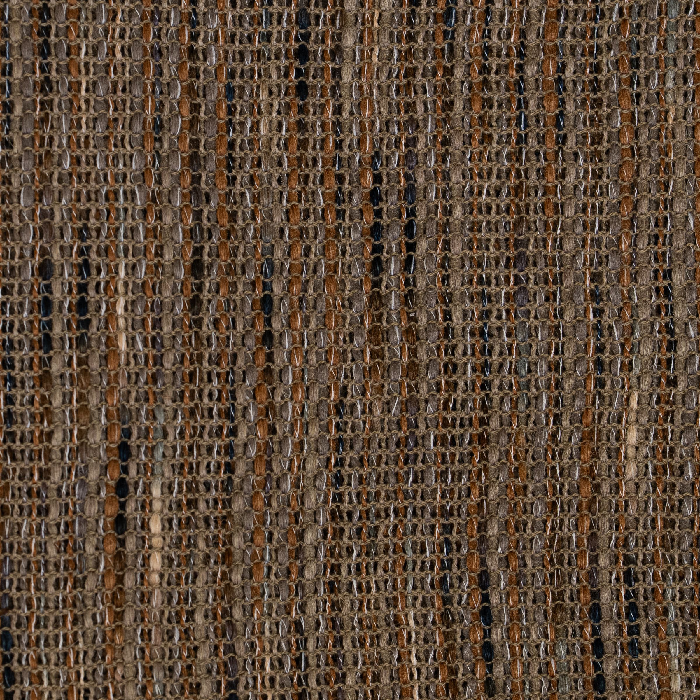 Loose weave fabric with intersection browns, grays, beige and black threads.