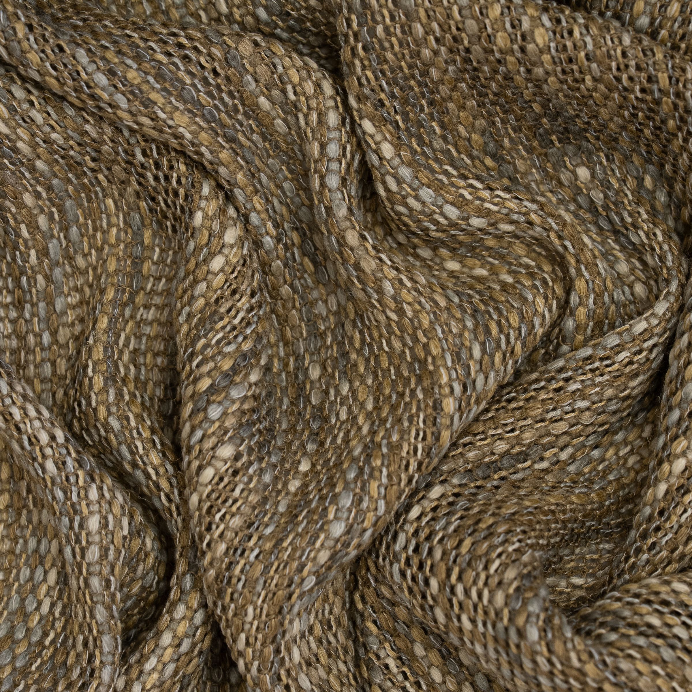 Loose weave brown, light gray and beige threads fabric with large wavy folds