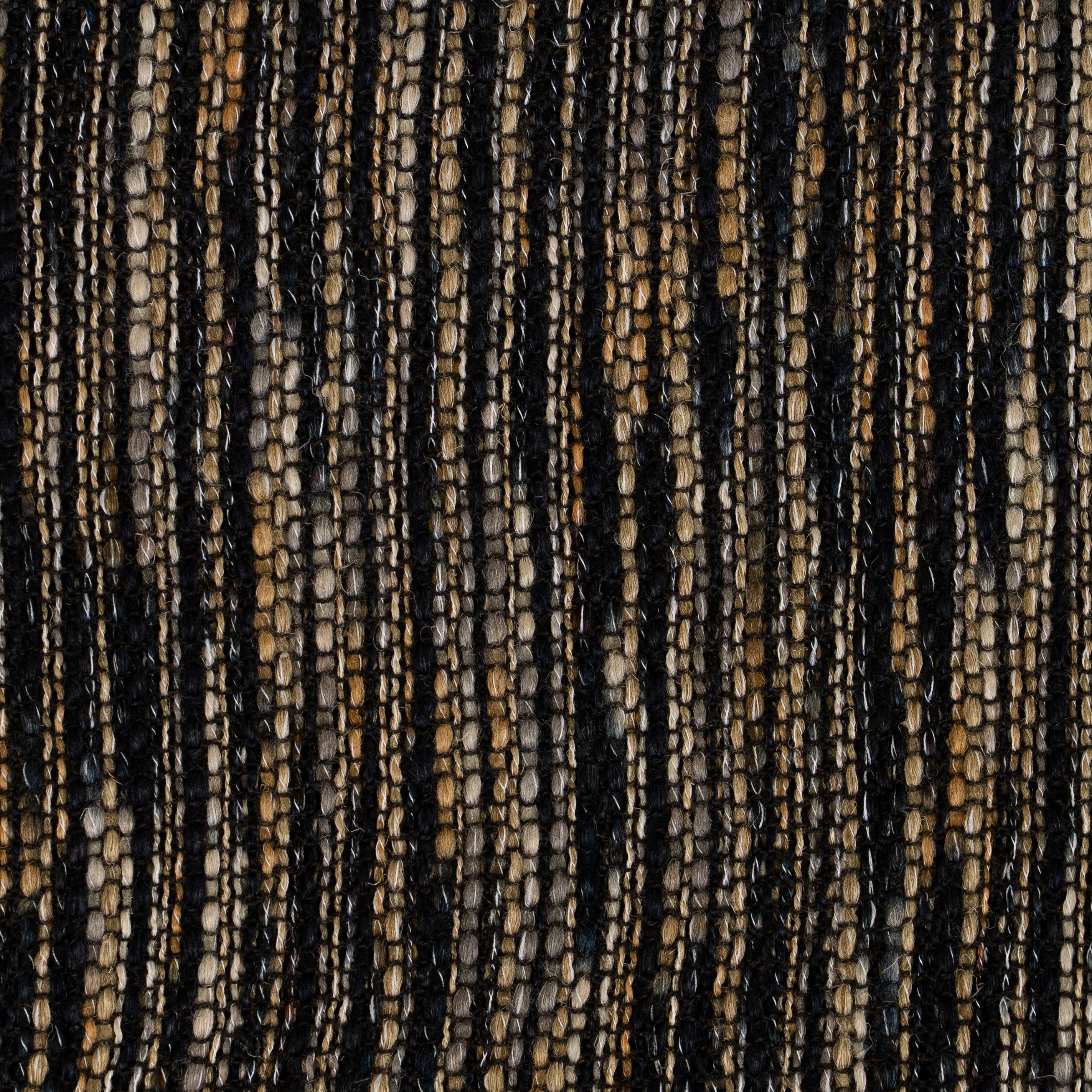 Close-up of loose weave fabric with black and brown stripes