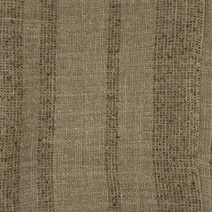 Close-up of beige fabric showing horizontal bands of brown with a visible woven texture.