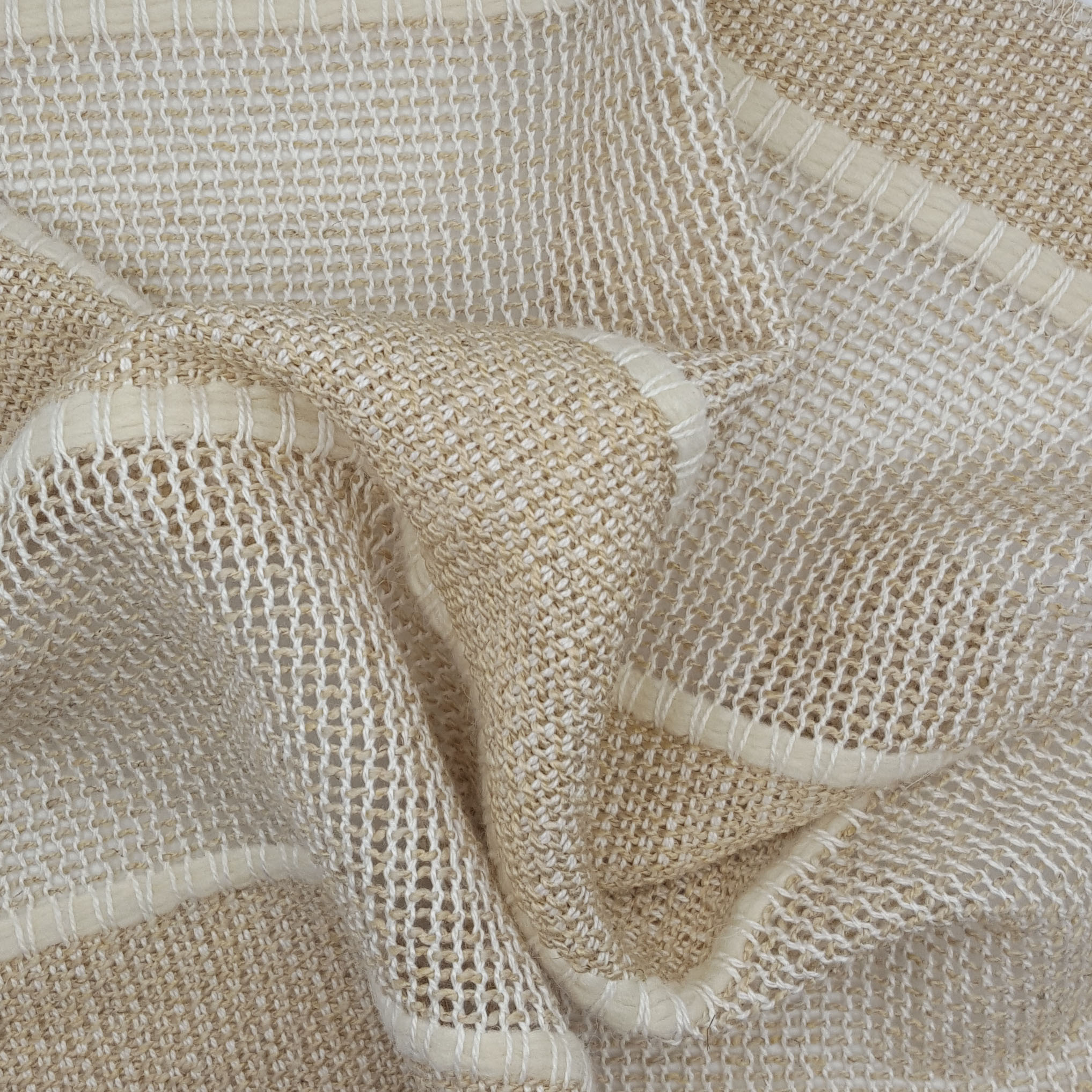 Light beige and white striped fabric with large wavy folds