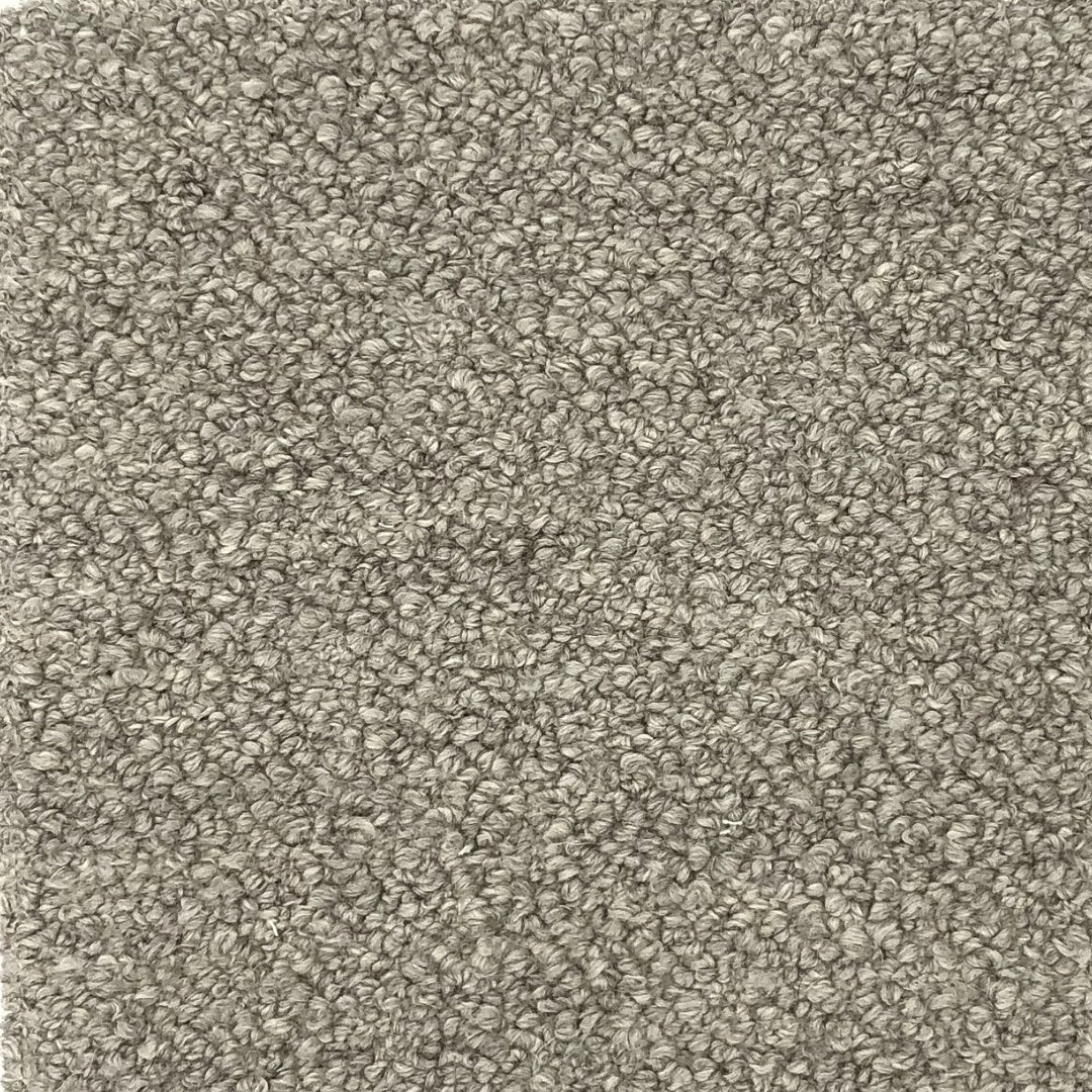 Light to medium gray fabric with a dense, uniform looped pile texture and a soft, matte appearance.