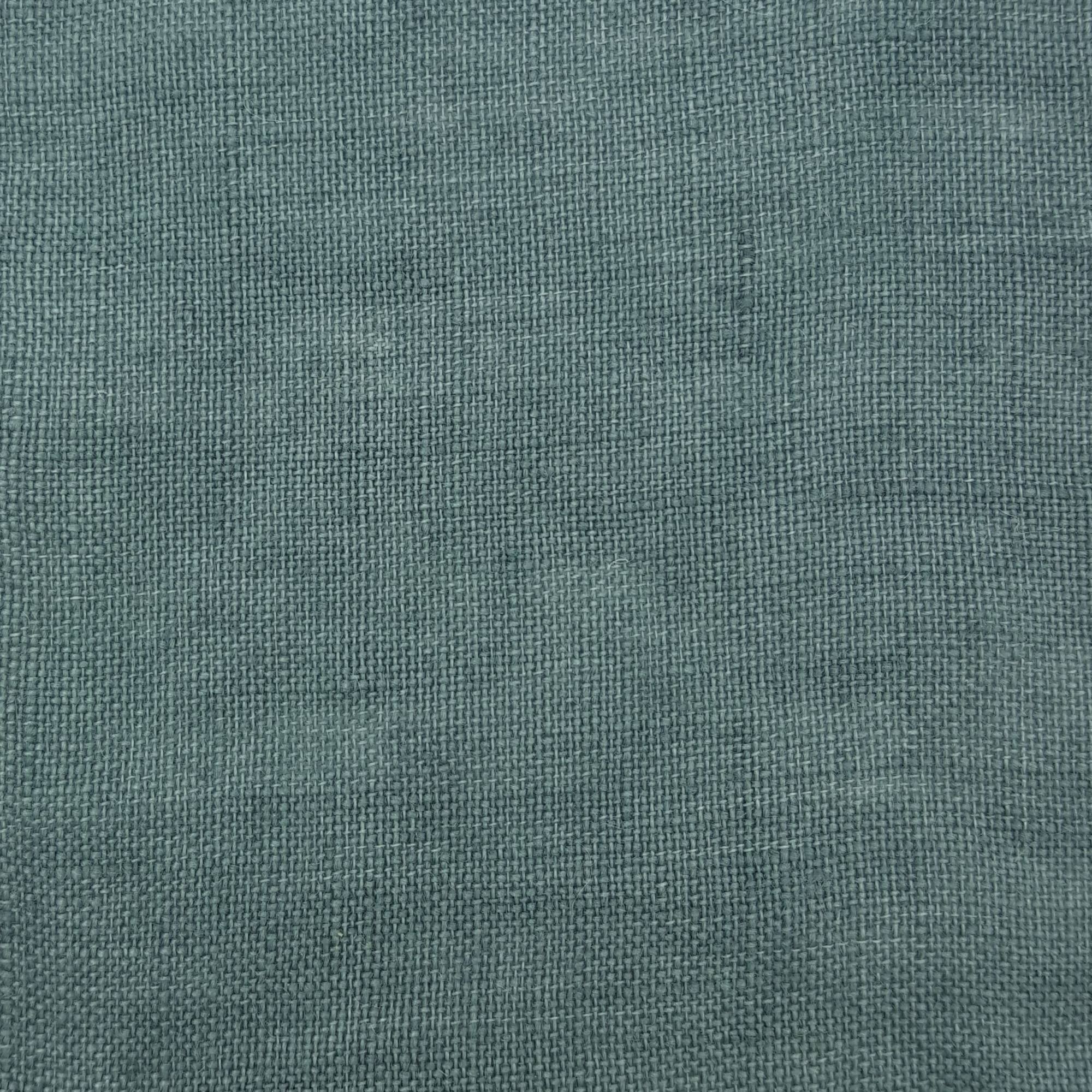 Matte sage green fabric showing a smooth, consistent surface and subtle woven texture. 