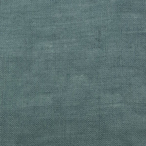 Matte sage green fabric showing a smooth, consistent surface and subtle woven texture. 