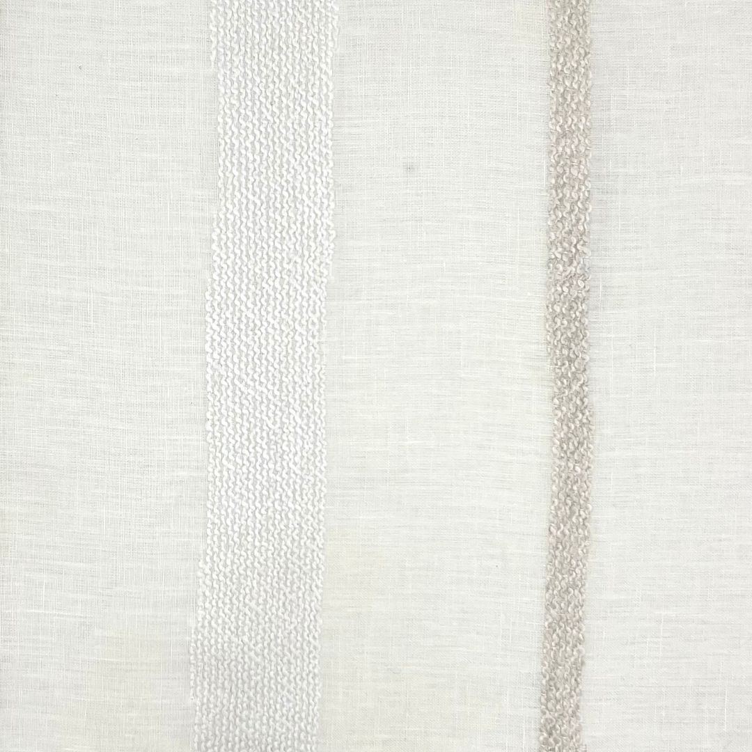 Light beige fabric with a visible plain weave and a matte finish.