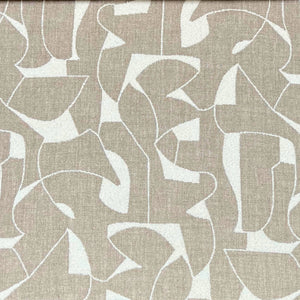 Cream-colored upholstery fabric with a textured, geometric pattern of interlocking shapes, reminiscent of abstract art.